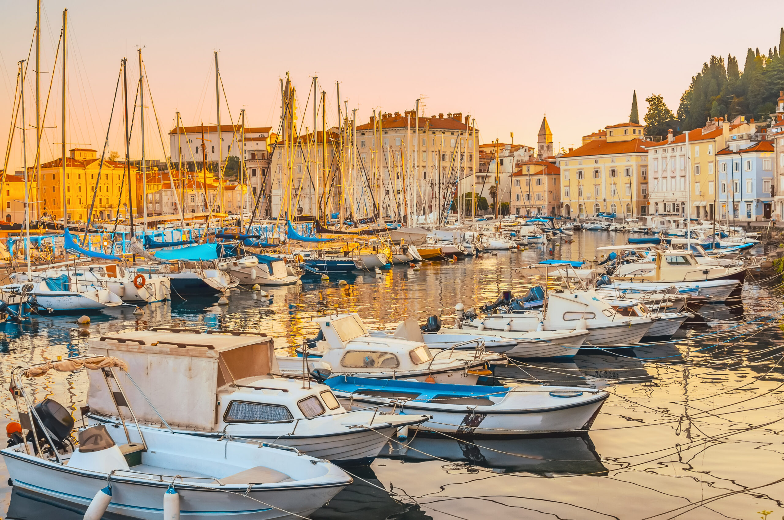 Mooring for fishing boats and yachts on the Mediterranean coast at dawn
